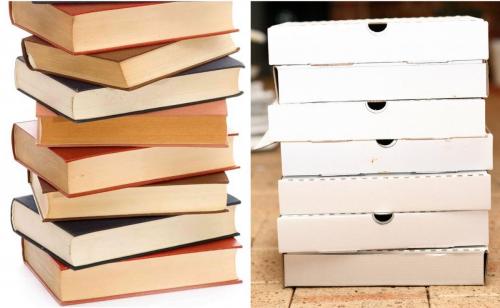 Stack of books and stack of pizza boxes