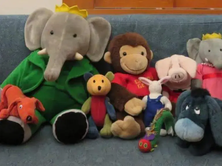 Stuffed animals on a couch