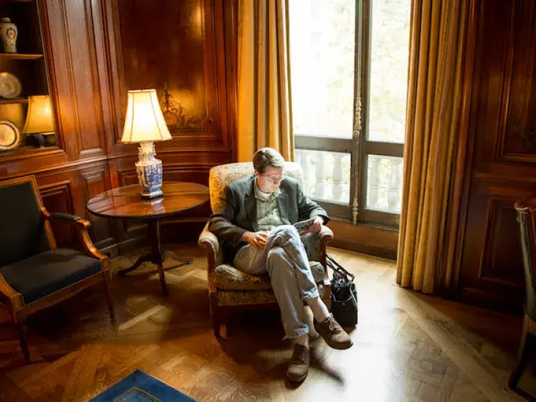 Person reading in Members' Room